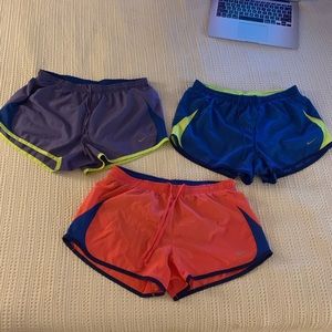 3 colorful Nike shorts